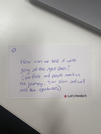 Handwritten attendee question about helping regulated industries adopt AI tools safely.